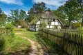 Historisches Fachwerkhaus mit Reetdach.