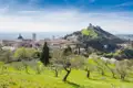 Assisi mit der Rocca Maggiore im Hintergrund.