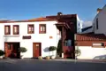 Traditionelles Gebäude der Quinta do Estreito Casas de Campo mit charakteristischer Architektur.